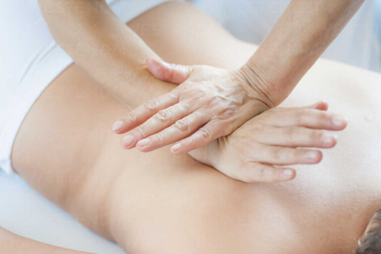 Hands on back during Tuina massage